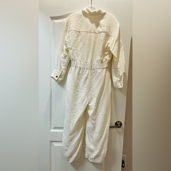 Sandro long-sleeved ivory pant Jumpsuit with gold snap buttons.Women’s M - Picture 10 of 13